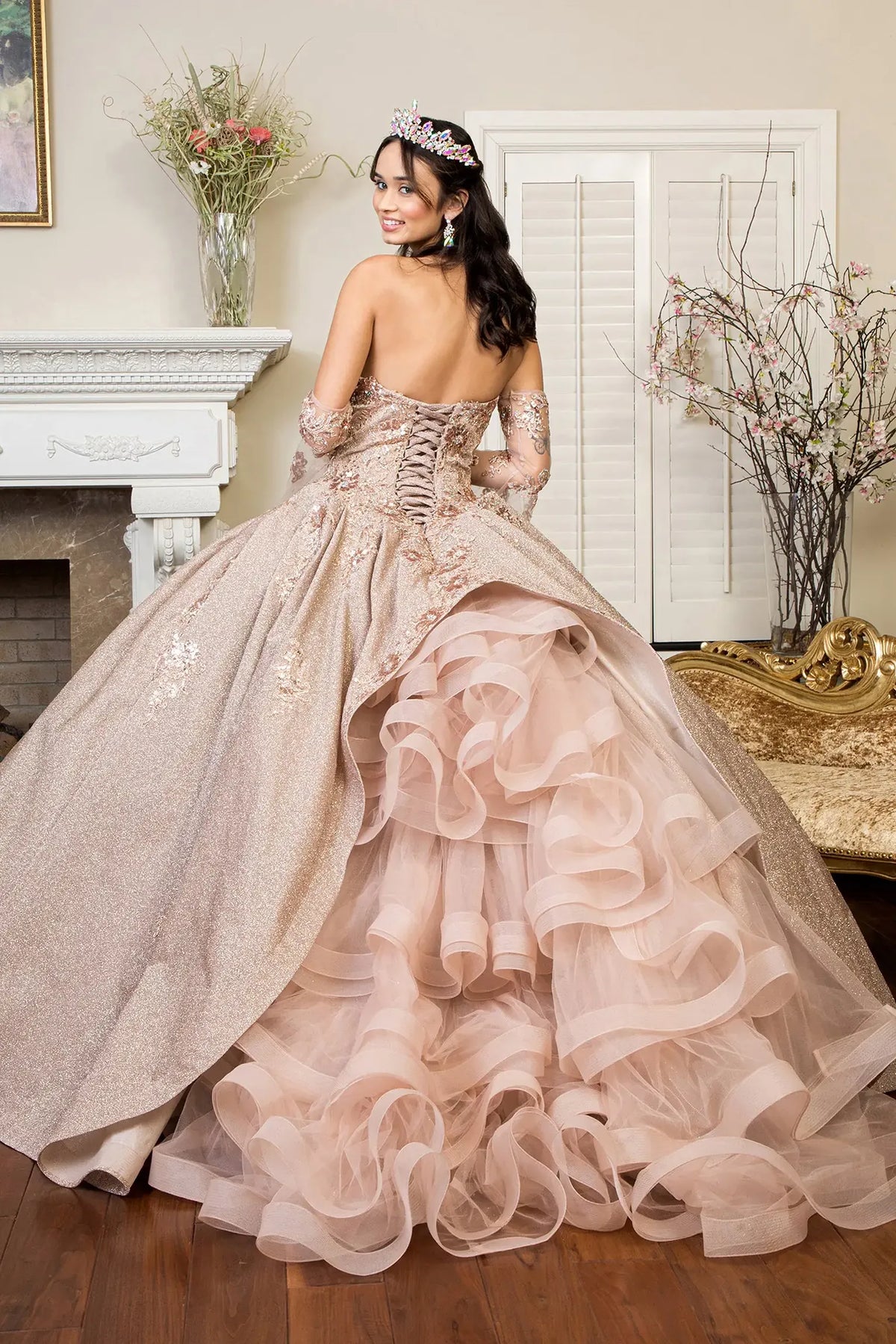 Lace-up back reveals the Rose Gold quinceañera ball gown with lace-up back and detachable mesh sleeves.