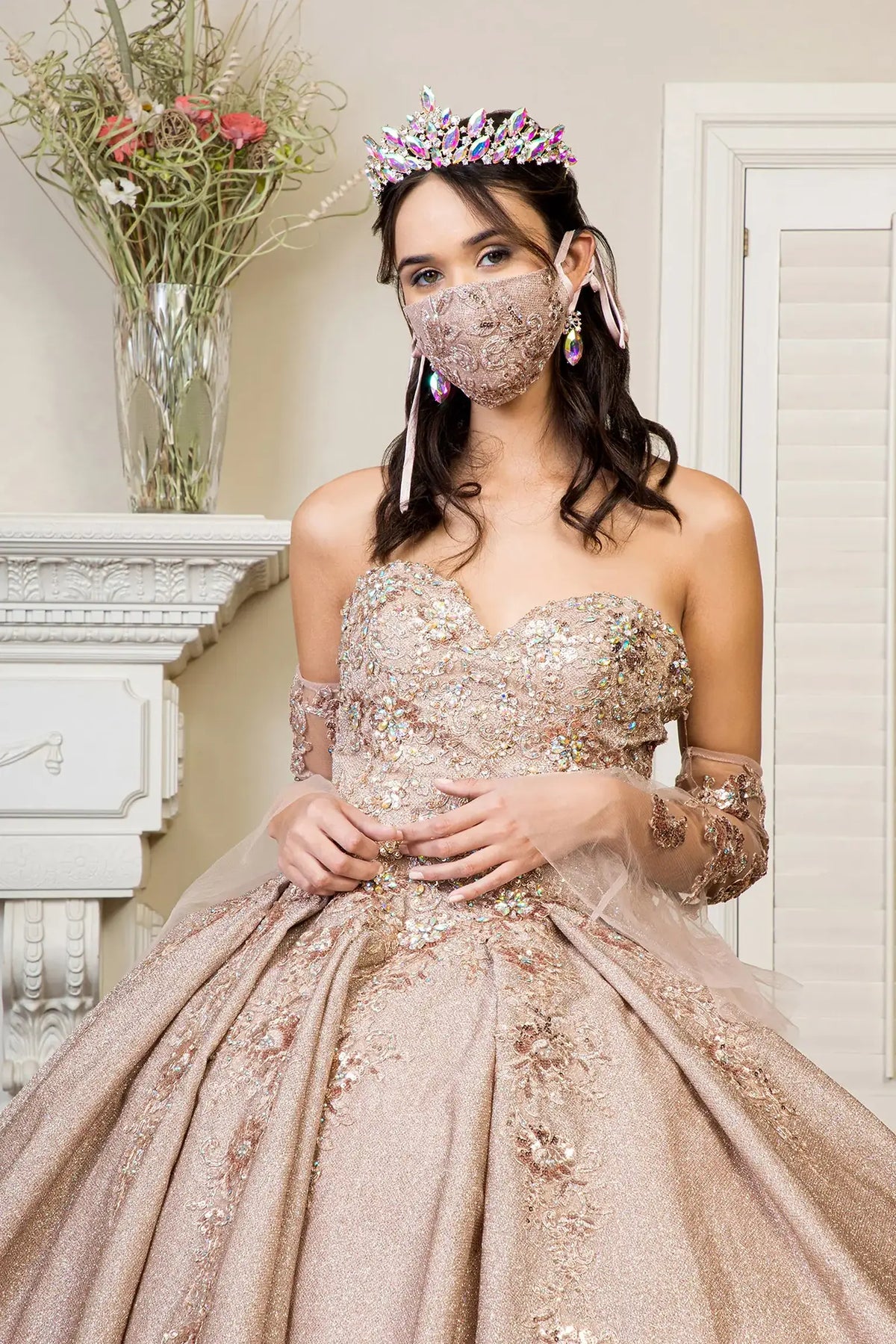 Bodice close-up highlights the Rose Gold quinceañera ball gown with detachable mesh sleeves.