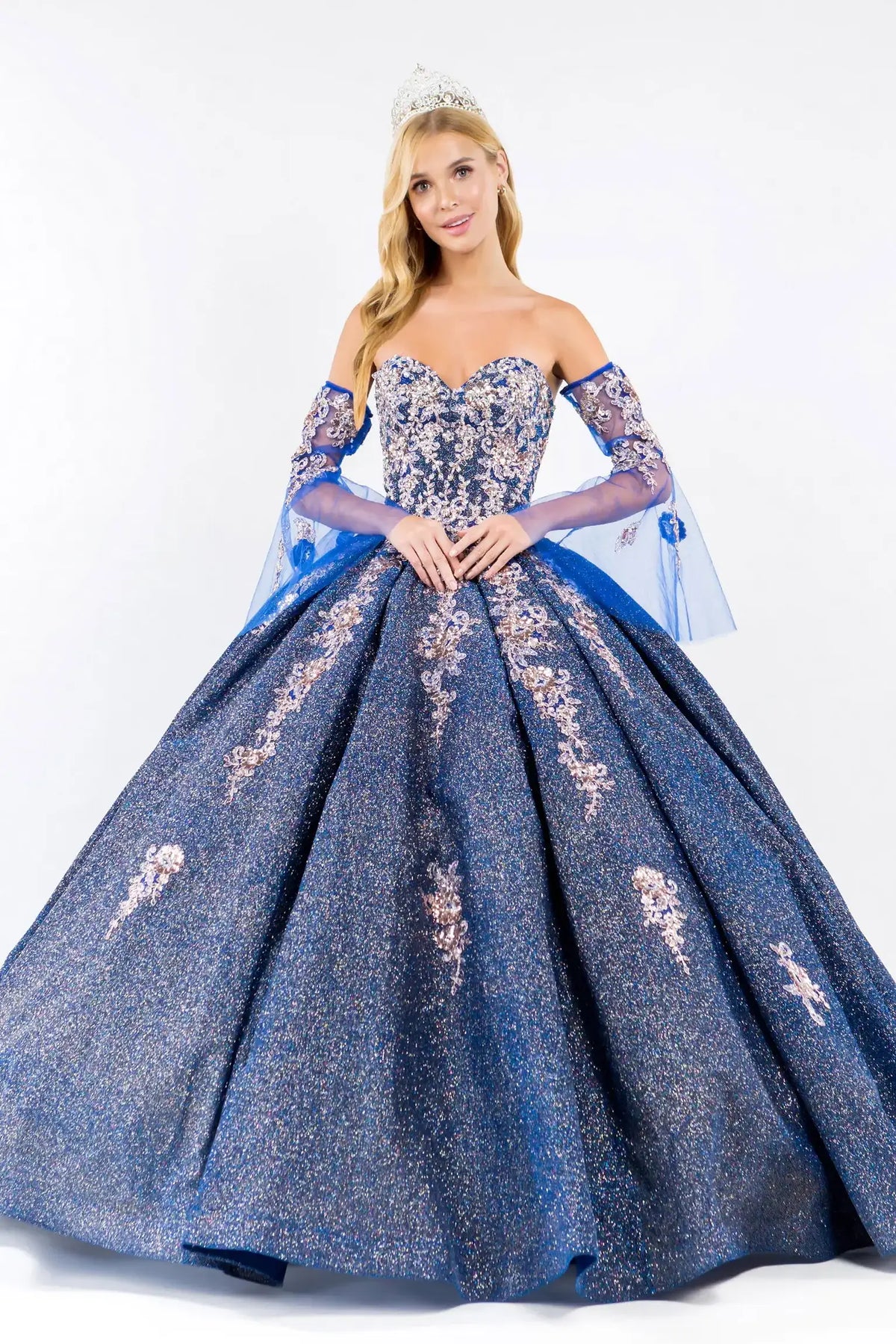 Full-length view presents the Royal Blue quinceañera ball gown with ruffled train.