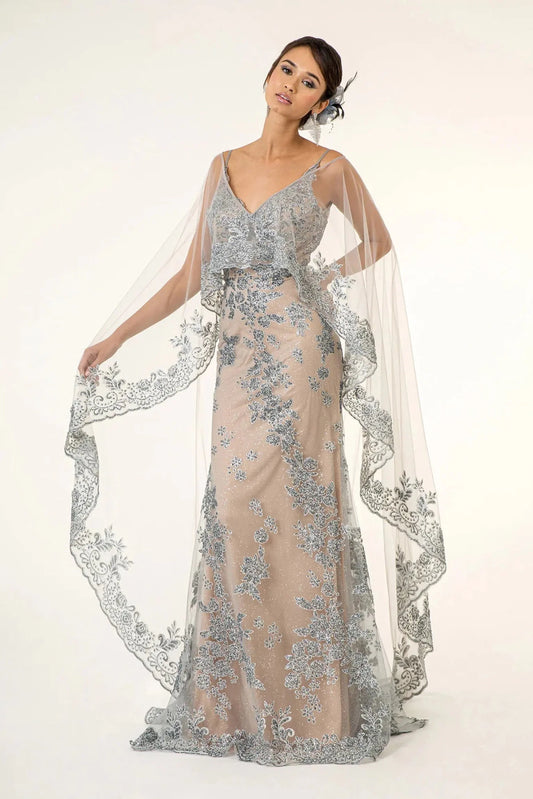 Full-length view highlights floor-length embroidered cape on the Silver/Nude mother of the bride dress.