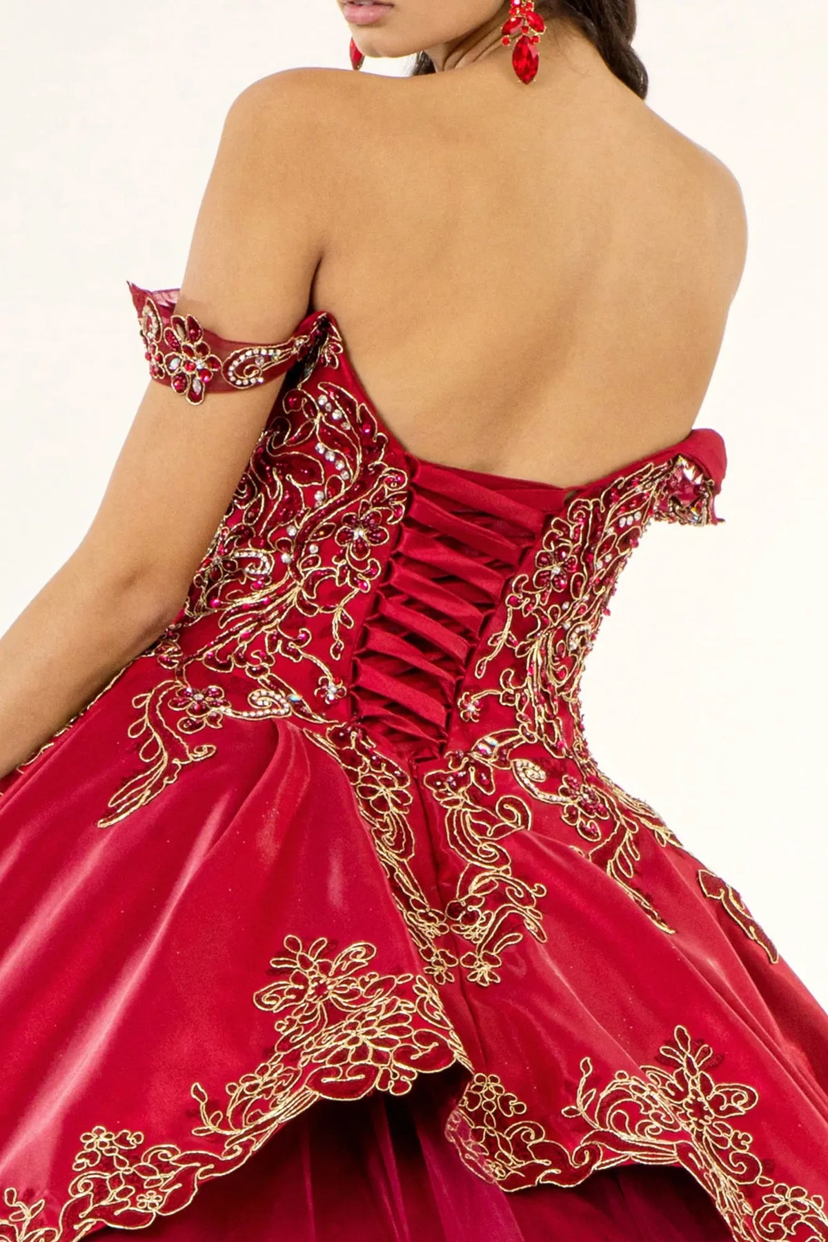 Embroidered details frame the Burgundy quinceañera ball gown with metallic embroidery.