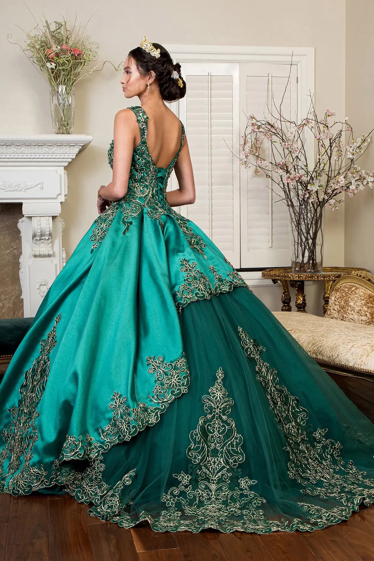 Lace-up back reveals the Green quinceañera ball gown with lace-up back and convertible shoulder straps.
