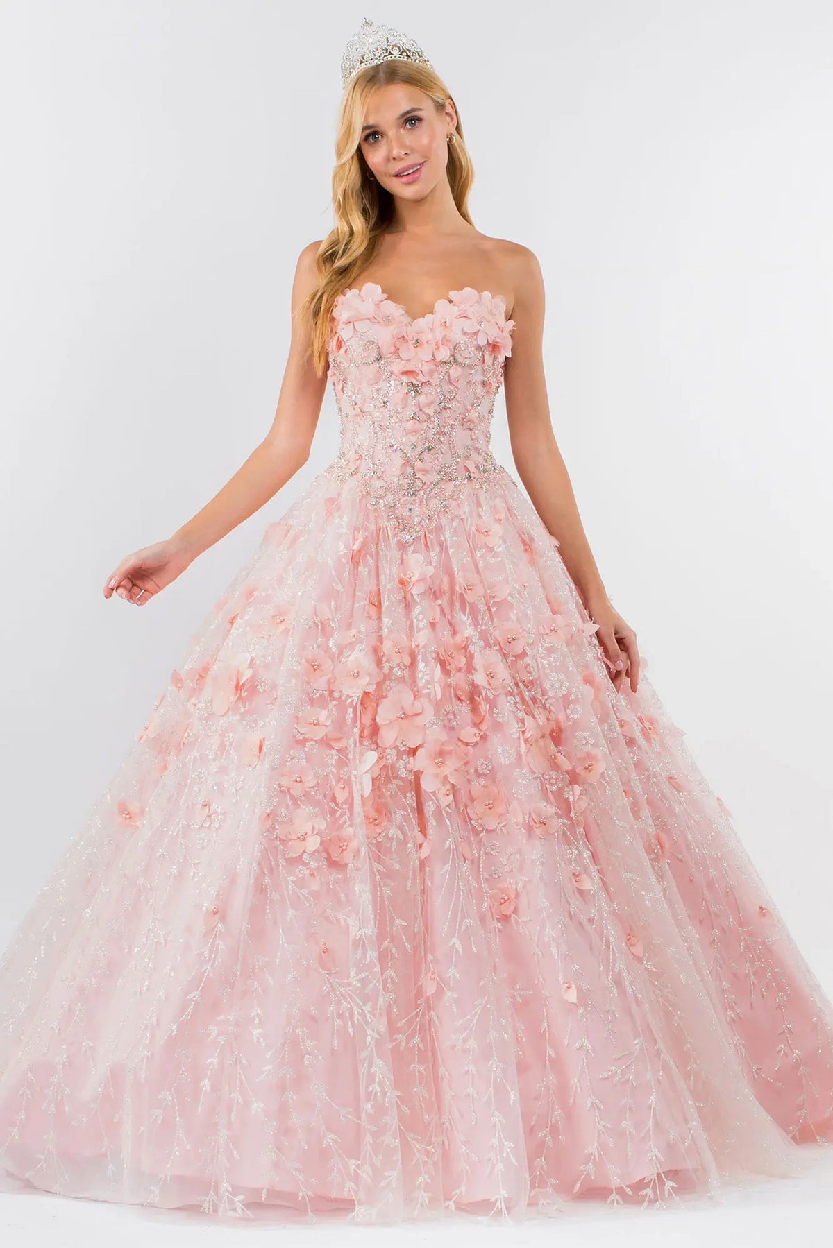 Embroidered details frame the Blush quinceañera ball gown with 3d floral cape.