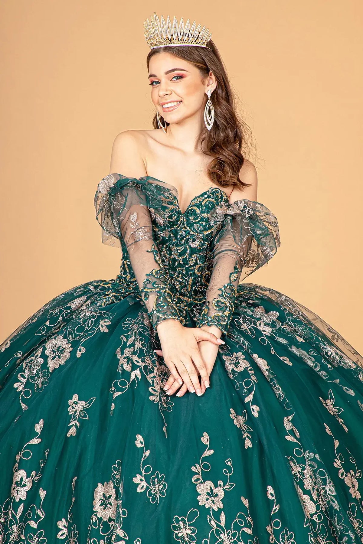 Full-length view presents the Emerald Green quinceañera ball gown with detachable long sleeves.
