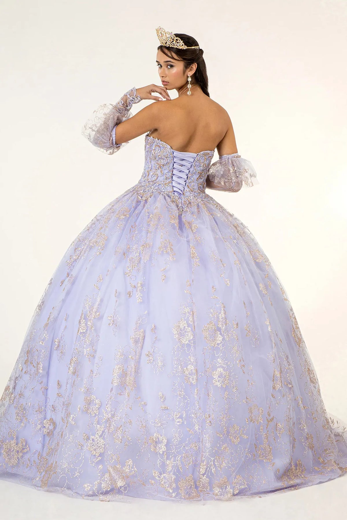 Lace-up back reveals the Lilac quinceañera ball gown with lace-up back and glitter embroidery.