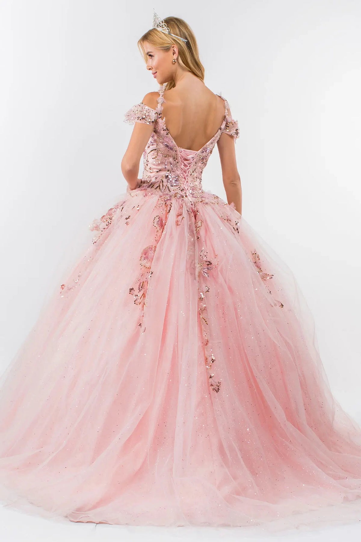 Lace-up back reveals the Blush quinceañera ball gown with lace-up back and beaded sweetheart bodice.