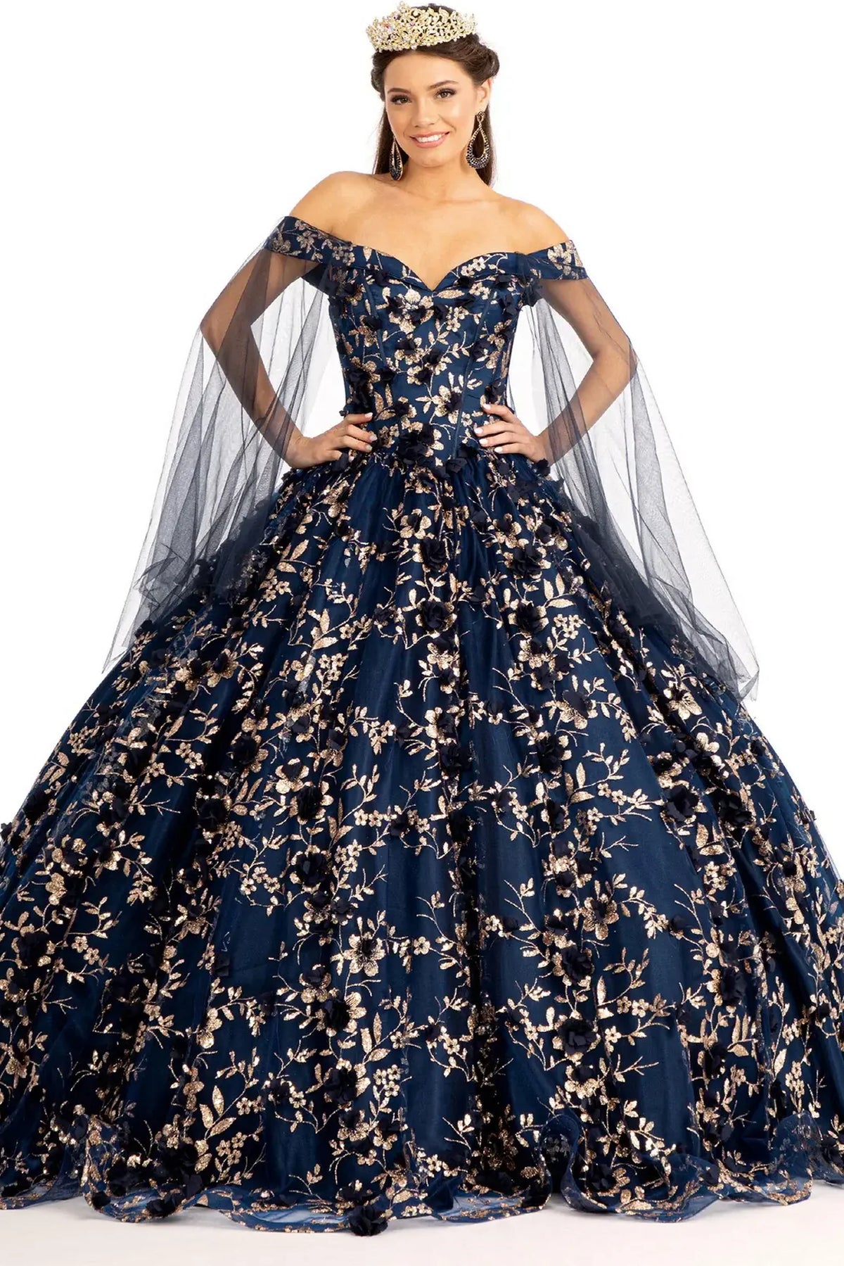 Lace-up back reveals the Navy quinceañera ball gown with lace-up back and draped shoulder mesh.