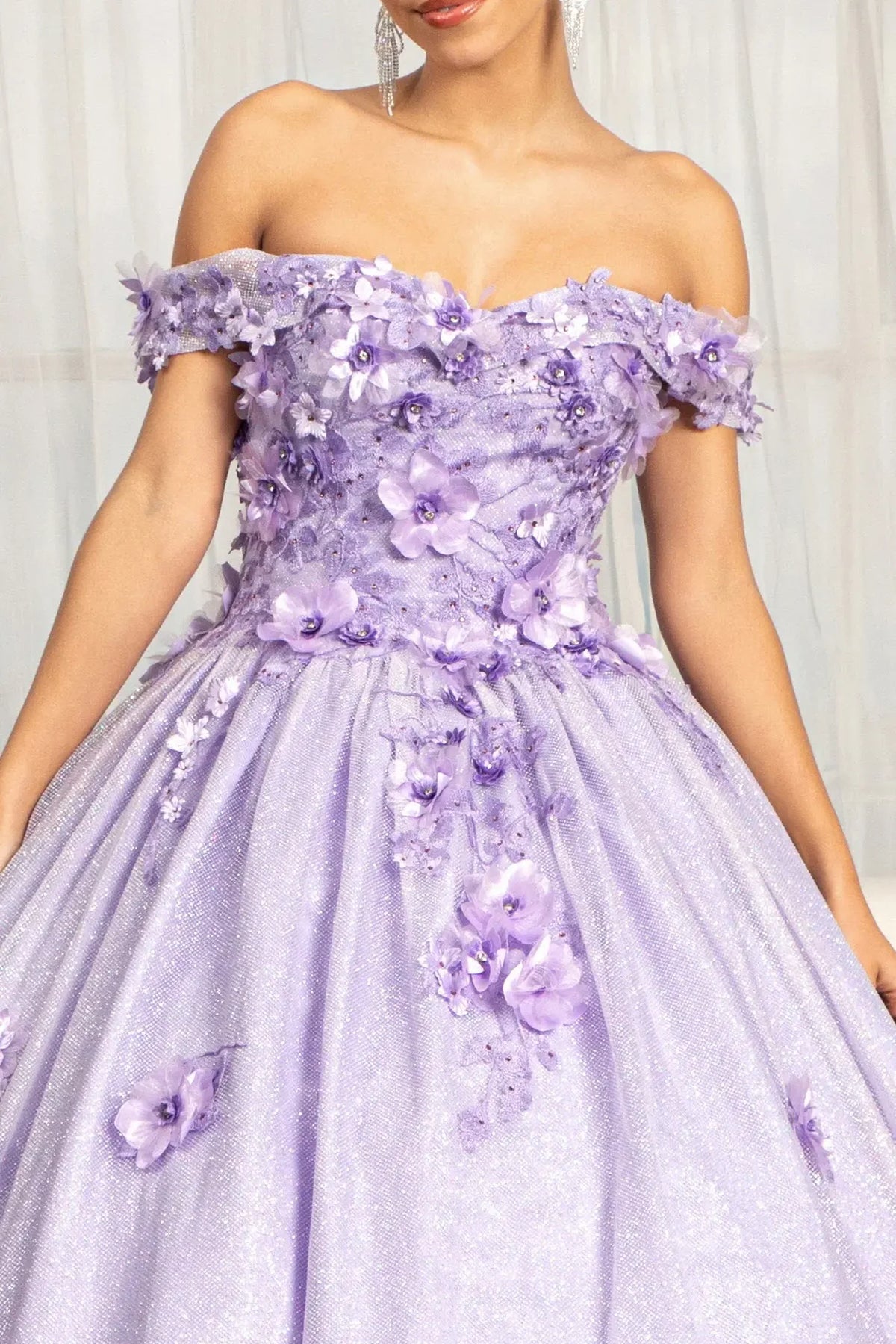 Full-length view presents the Lilac quinceañera ball gown with 3d floral appliqués.