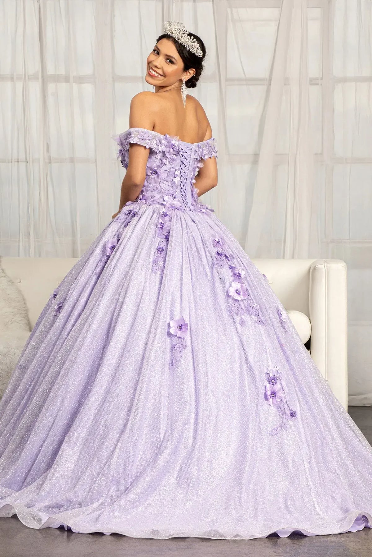 Bodice close-up highlights the Lilac quinceañera ball gown with glitter mesh skirt.