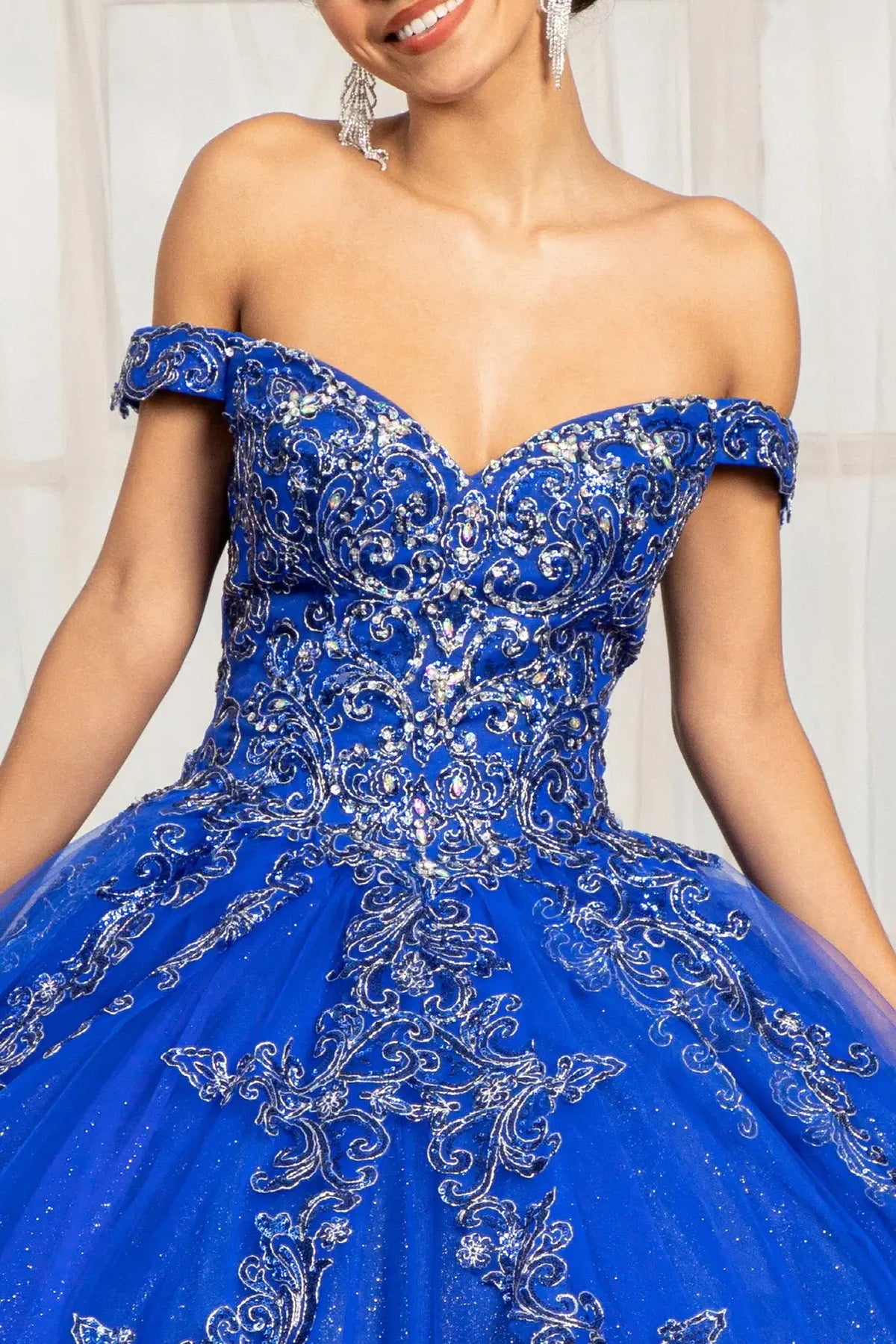 Full-length view presents the Royal Blue quinceañera ball gown with glitter embroidery.