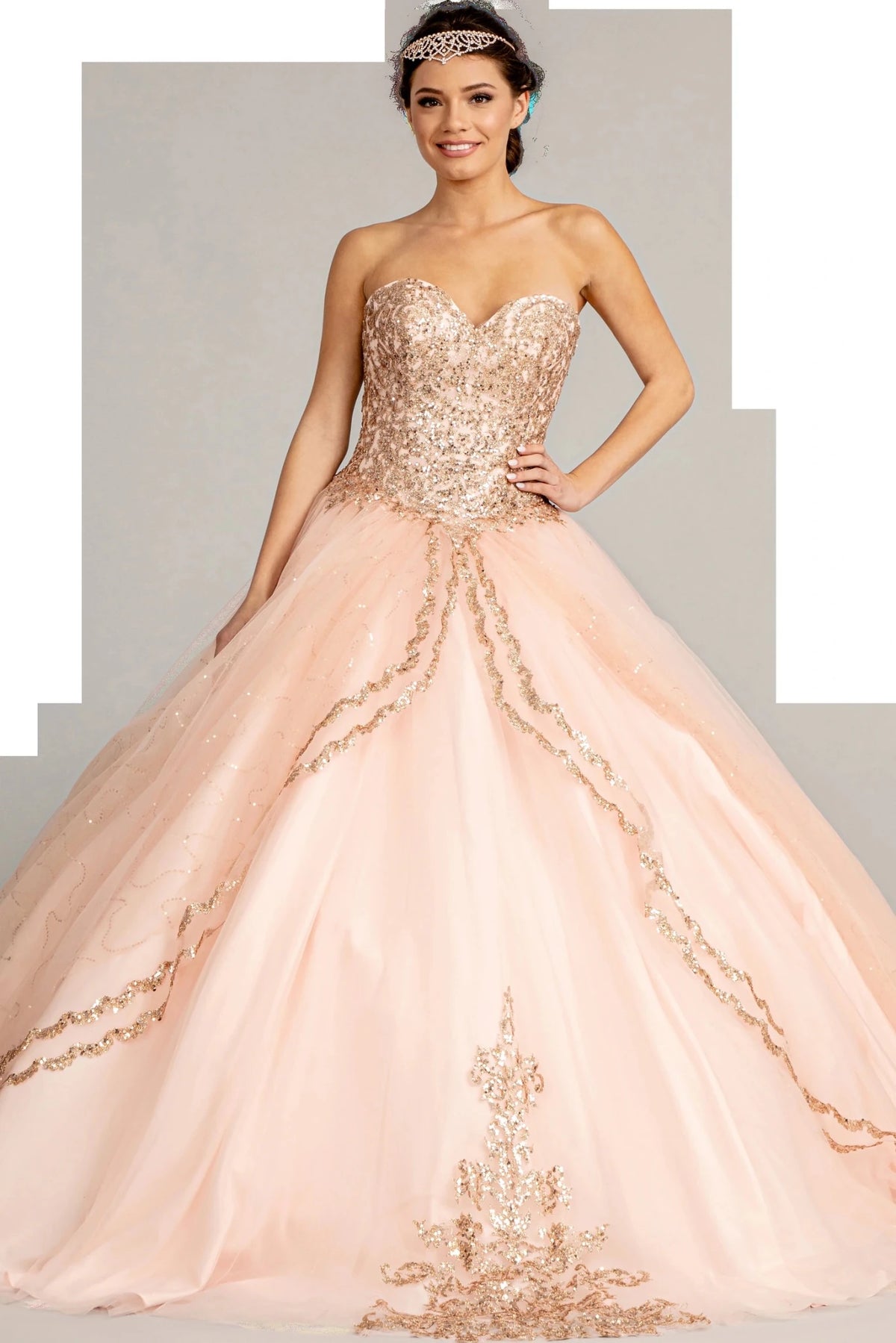 Lace-up back reveals the Blush quinceañera ball gown with lace-up back and sweetheart neckline.
