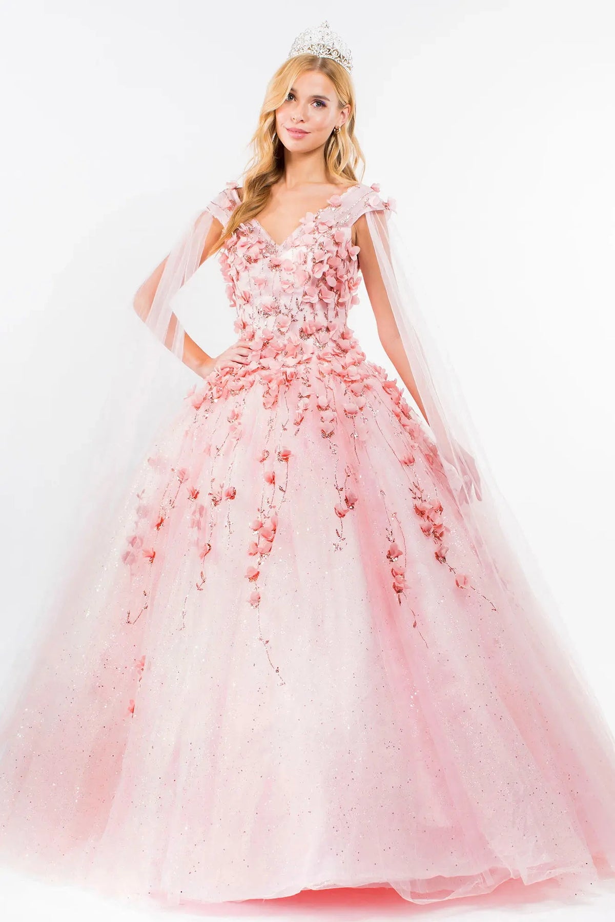 Full-length view presents the Blush quinceañera ball gown with detachable cape sleeves.