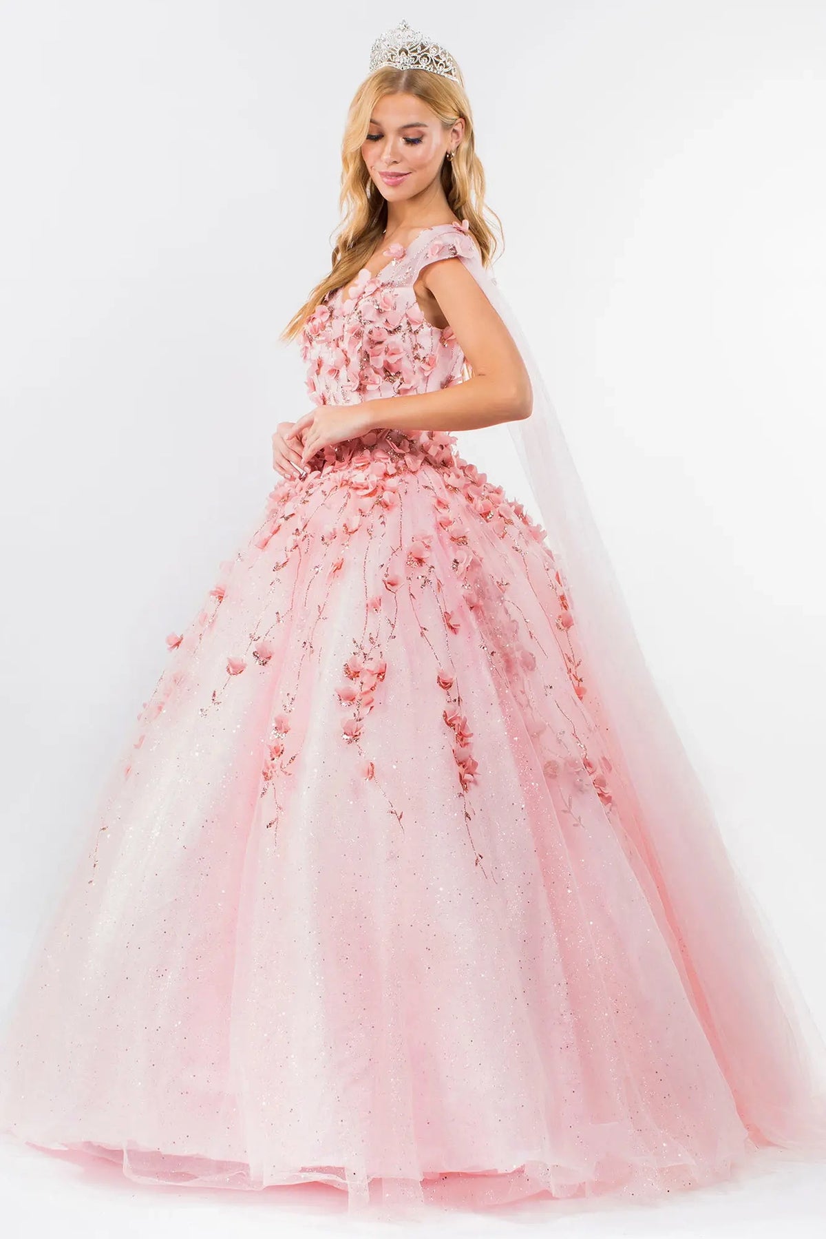 Bodice close-up highlights the Blush quinceañera ball gown with 3d floral appliqués.