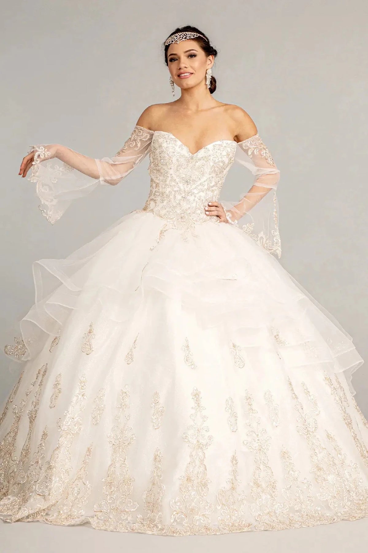 Lace-up back reveals the Off White quinceañera ball gown with lace-up back and glitter embroidery.