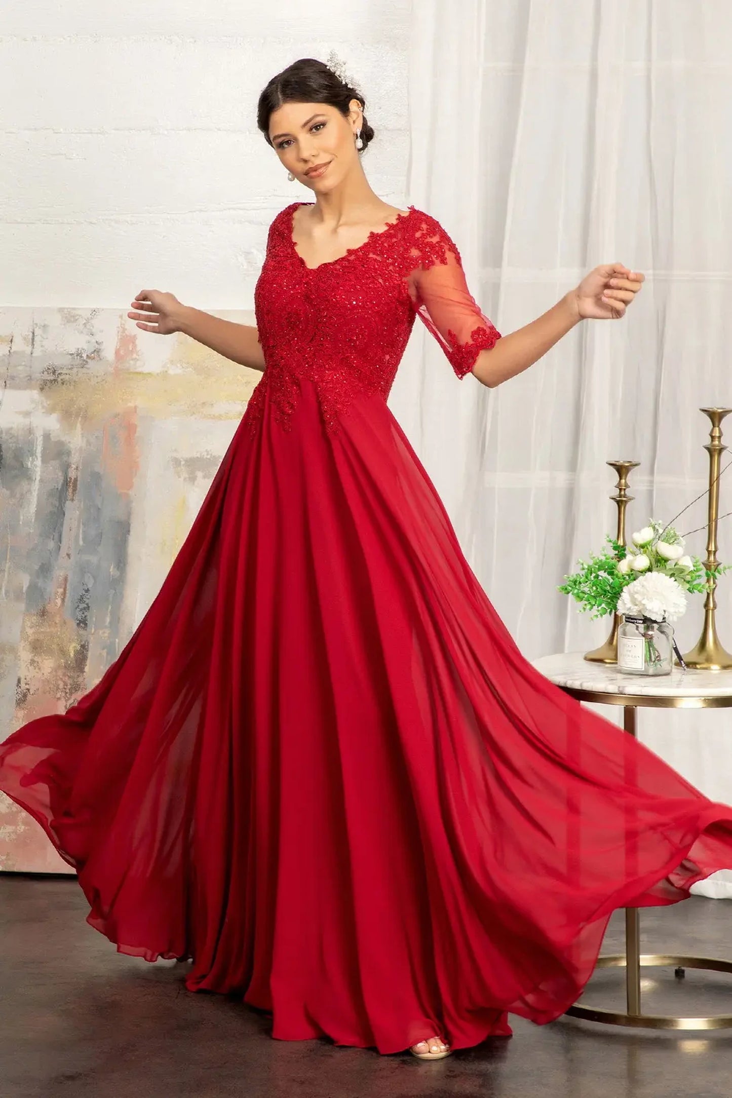 Burgundy mother of the bride dress featuring chiffon skirt with a-line shaping and rhinestones, embroidery, jewels, appliqués