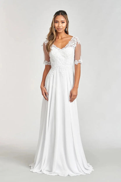 Bodice close-up highlights off White chiffon a-line mother of the bride dress with v-neckline.