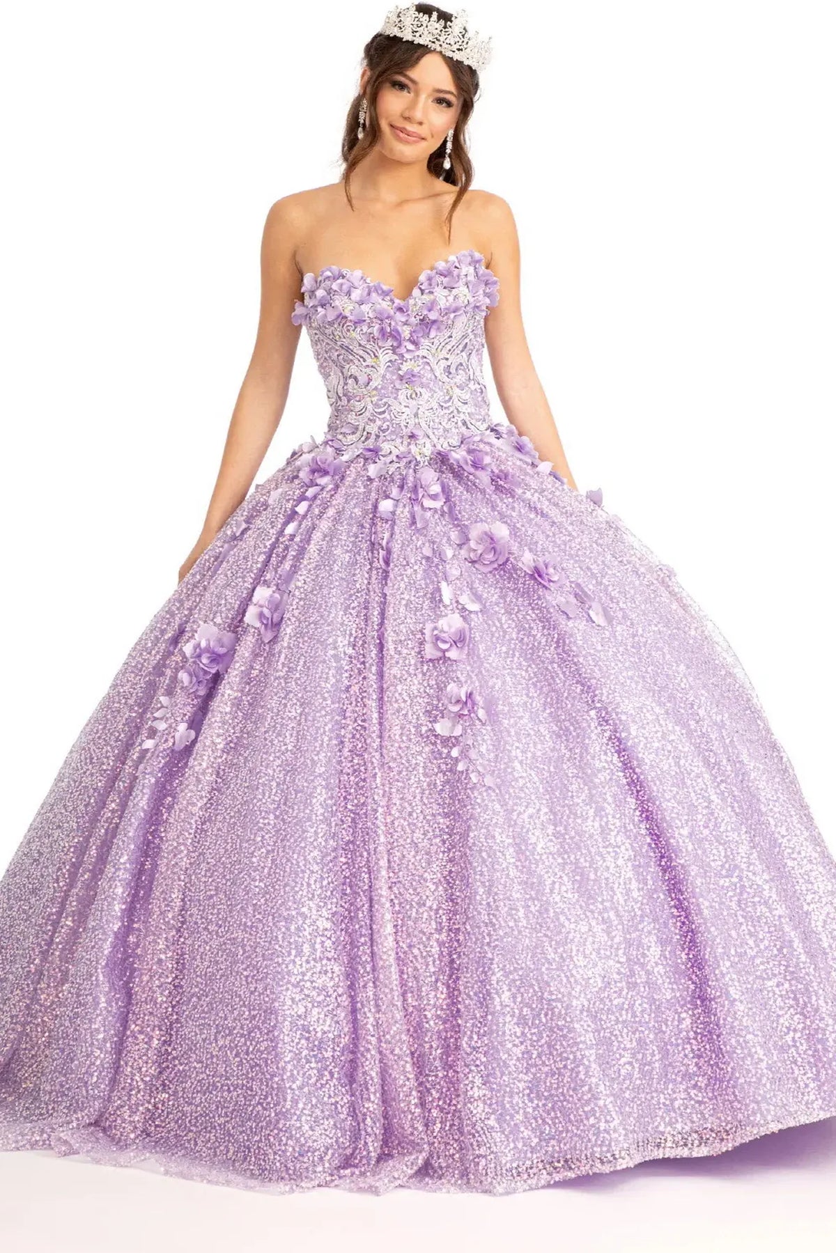 Embroidered details frame the Lilac quinceañera ball gown with 3d floral appliqués.