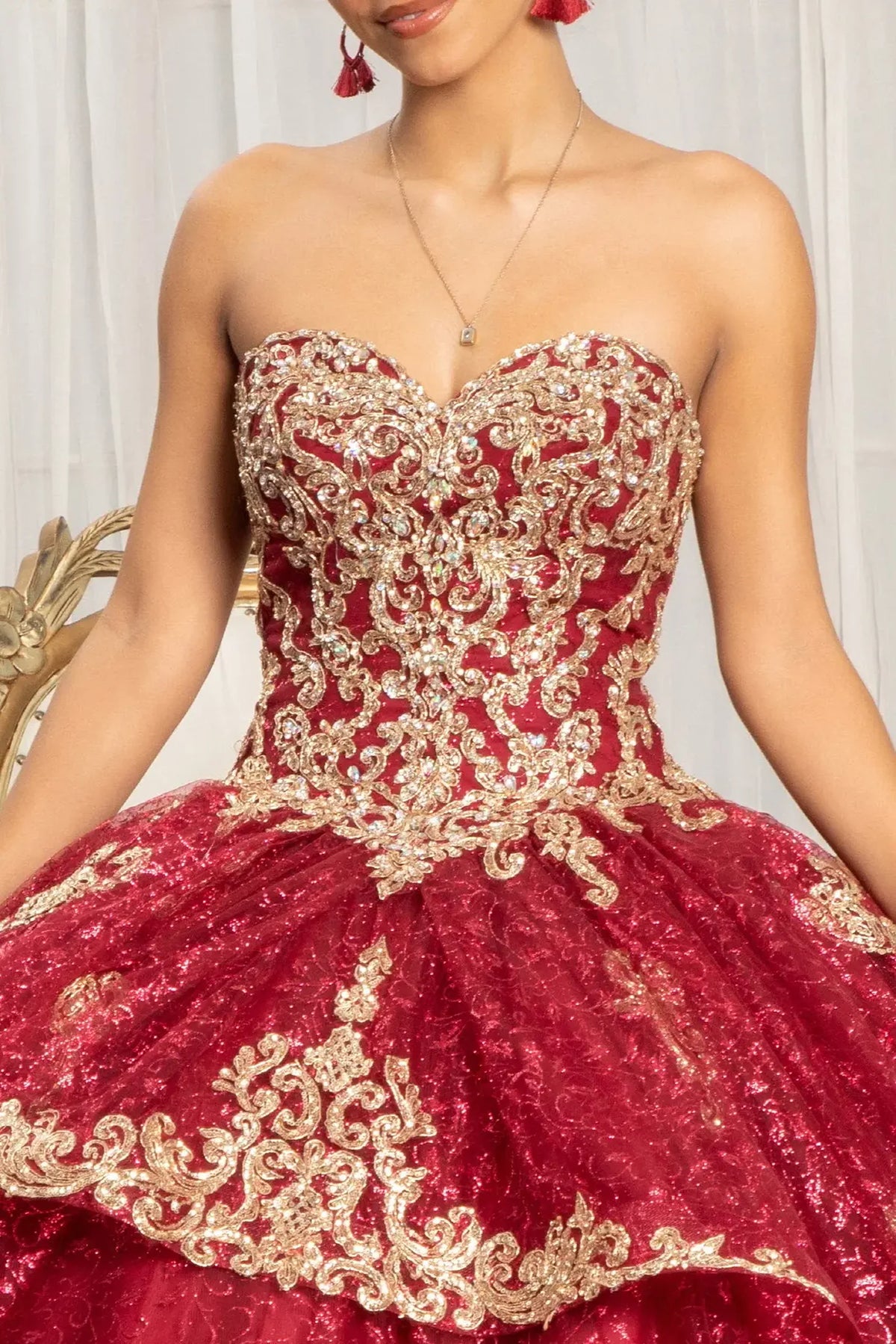 Full-length view presents the Burgundy quinceañera ball gown with sequin pattern.