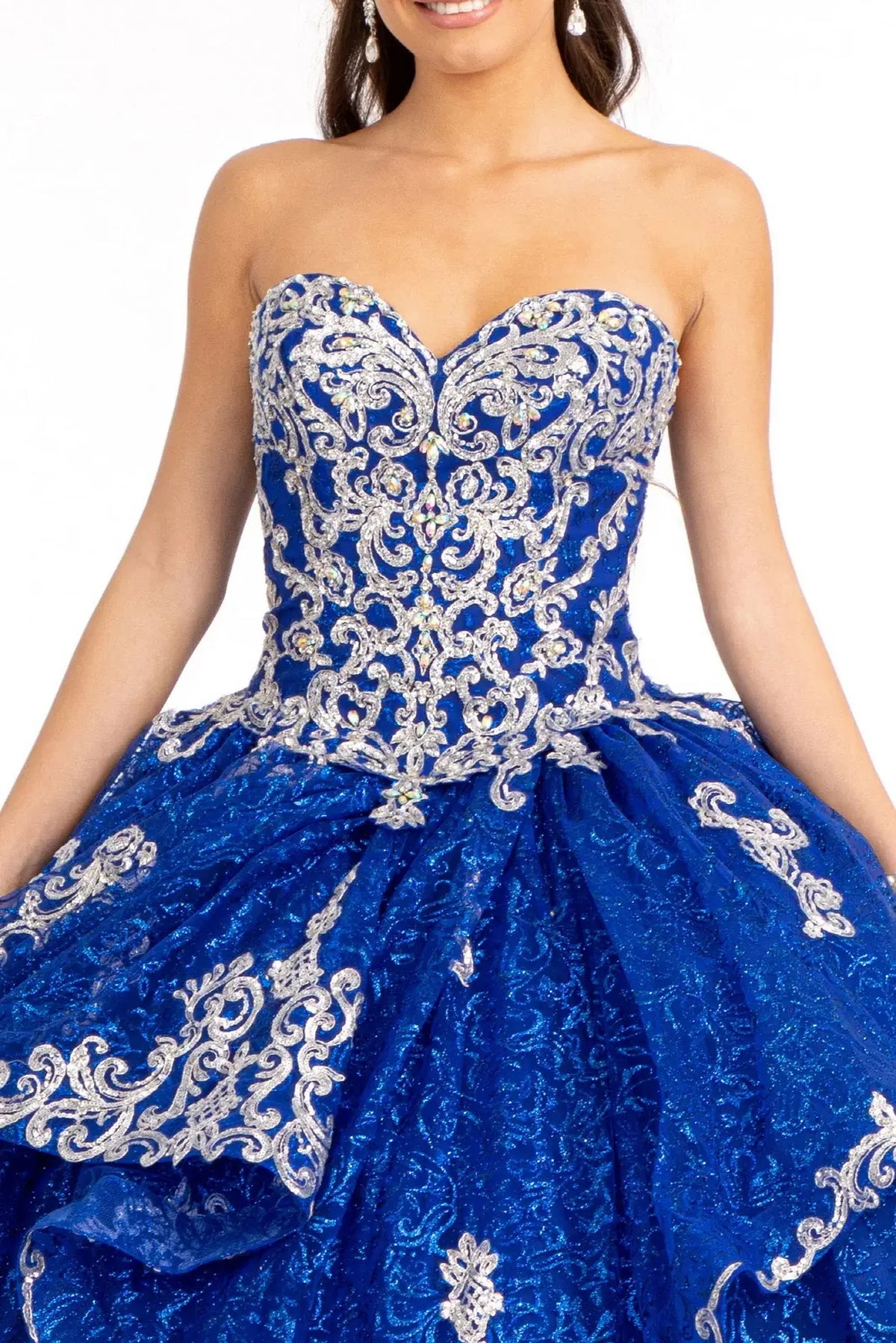 Full-length view presents the Royal Blue quinceañera ball gown with sequin pattern.