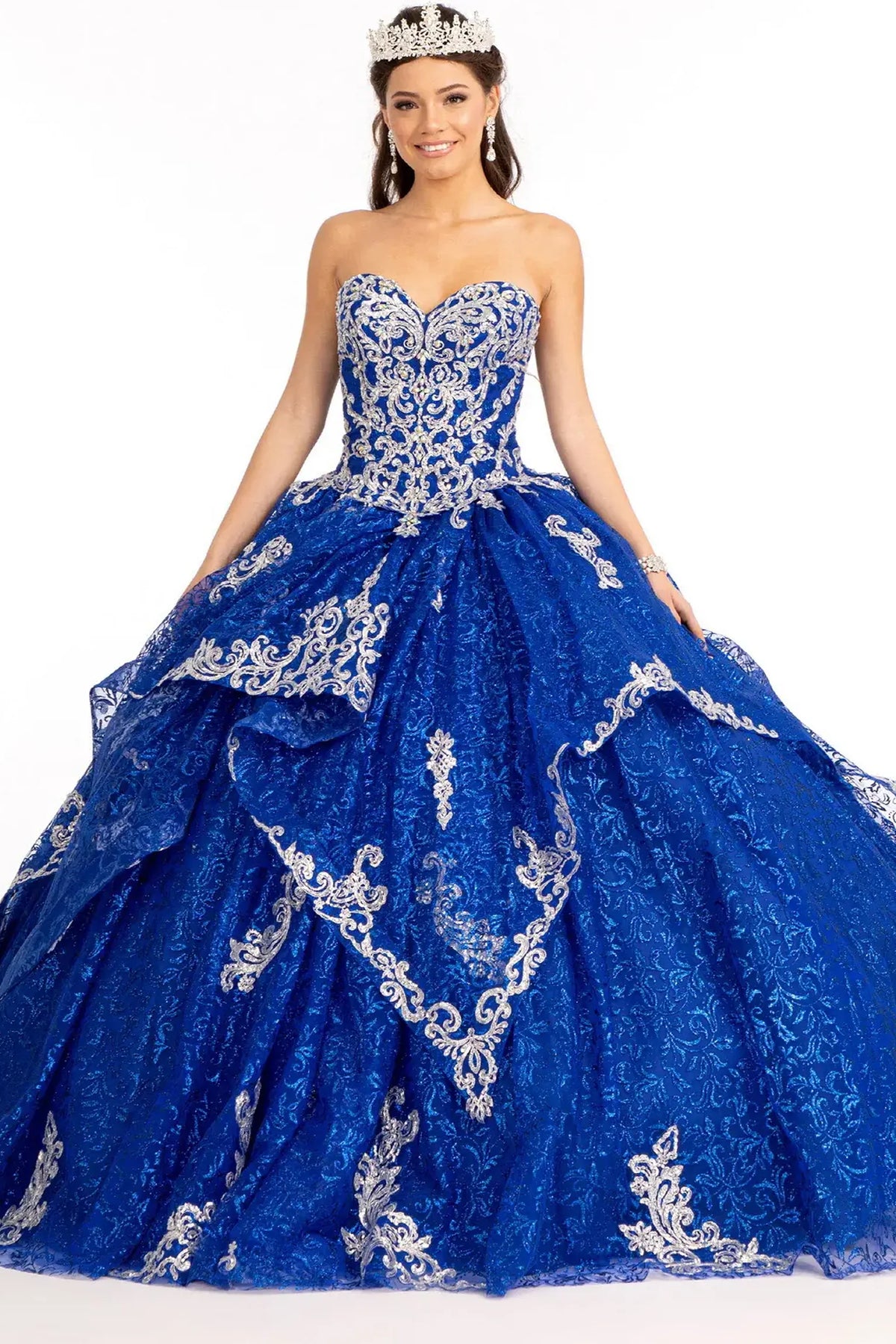 Lace-up back reveals the Royal Blue quinceañera ball gown with lace-up back and embroidered mesh skirt.