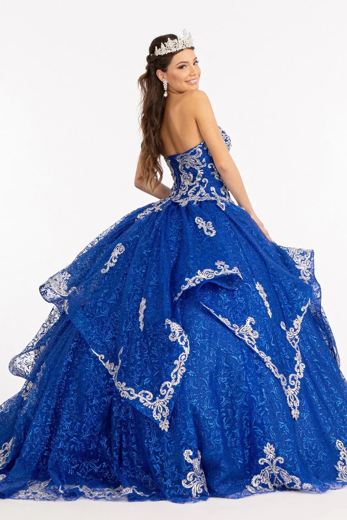 Bodice close-up highlights the Royal Blue quinceañera ball gown with embroidered mesh skirt.