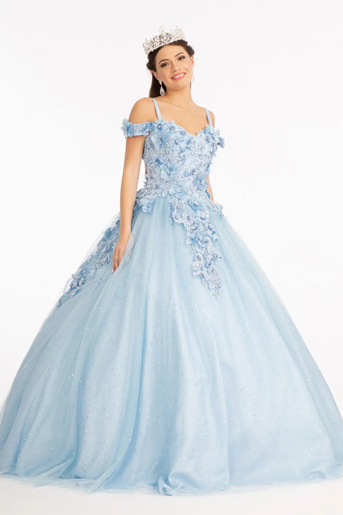 Embroidered details frame the Baby Blue quinceañera ball gown with 3d floral appliqués.