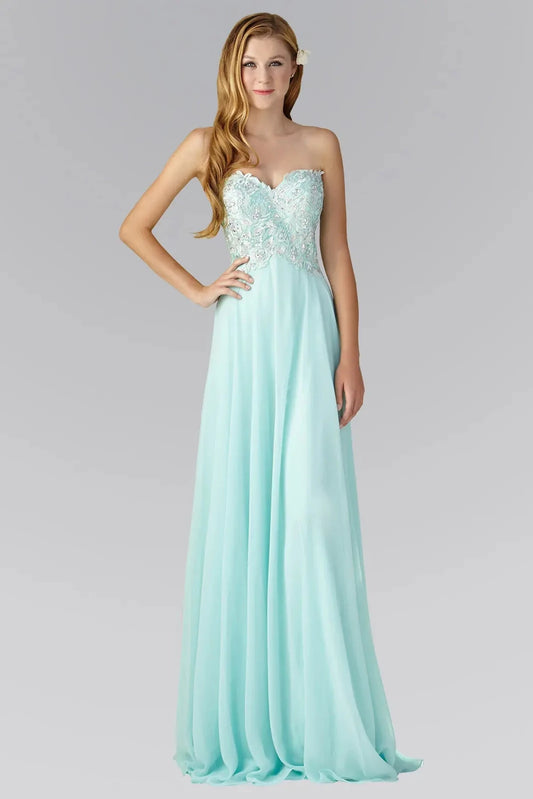Full-length front view shows beaded strapless styling on the Tiffany prom evening dress.