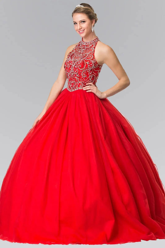 The Red quinceañera ball gown appears head to toe with a high jeweled neckline and vivid red tulle skirt.