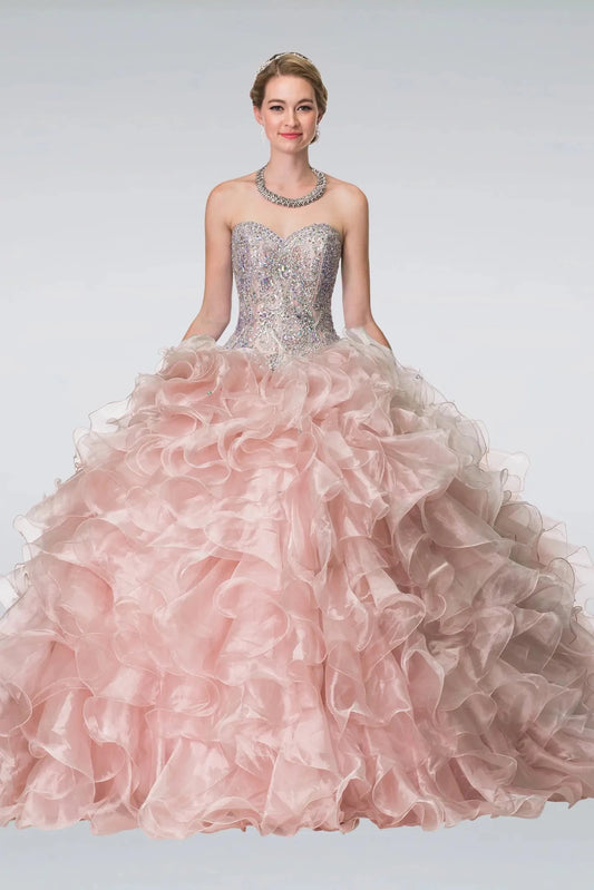 Full-length Blush quinceañera ball gown showcases a silver corset bodice and sculpted organza swirl skirt.