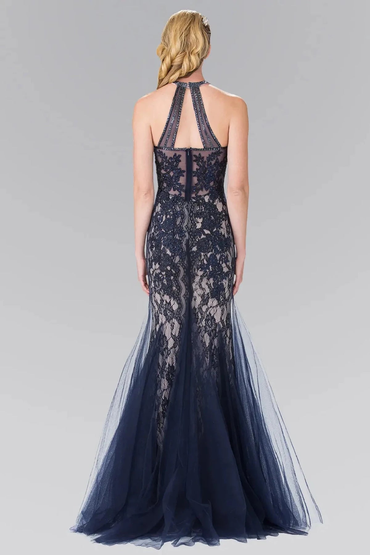 Rear view highlights the sheer back of the Navy prom evening dress.