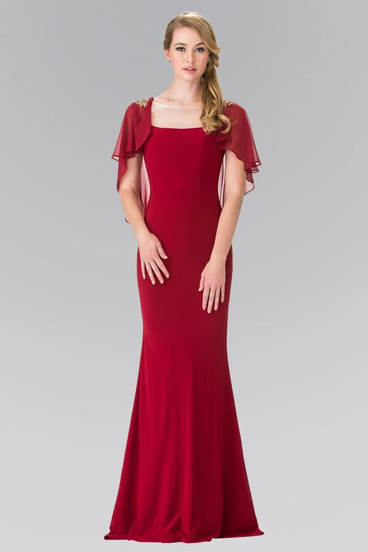 Bodice close-up highlights burgundy beading formal dress.