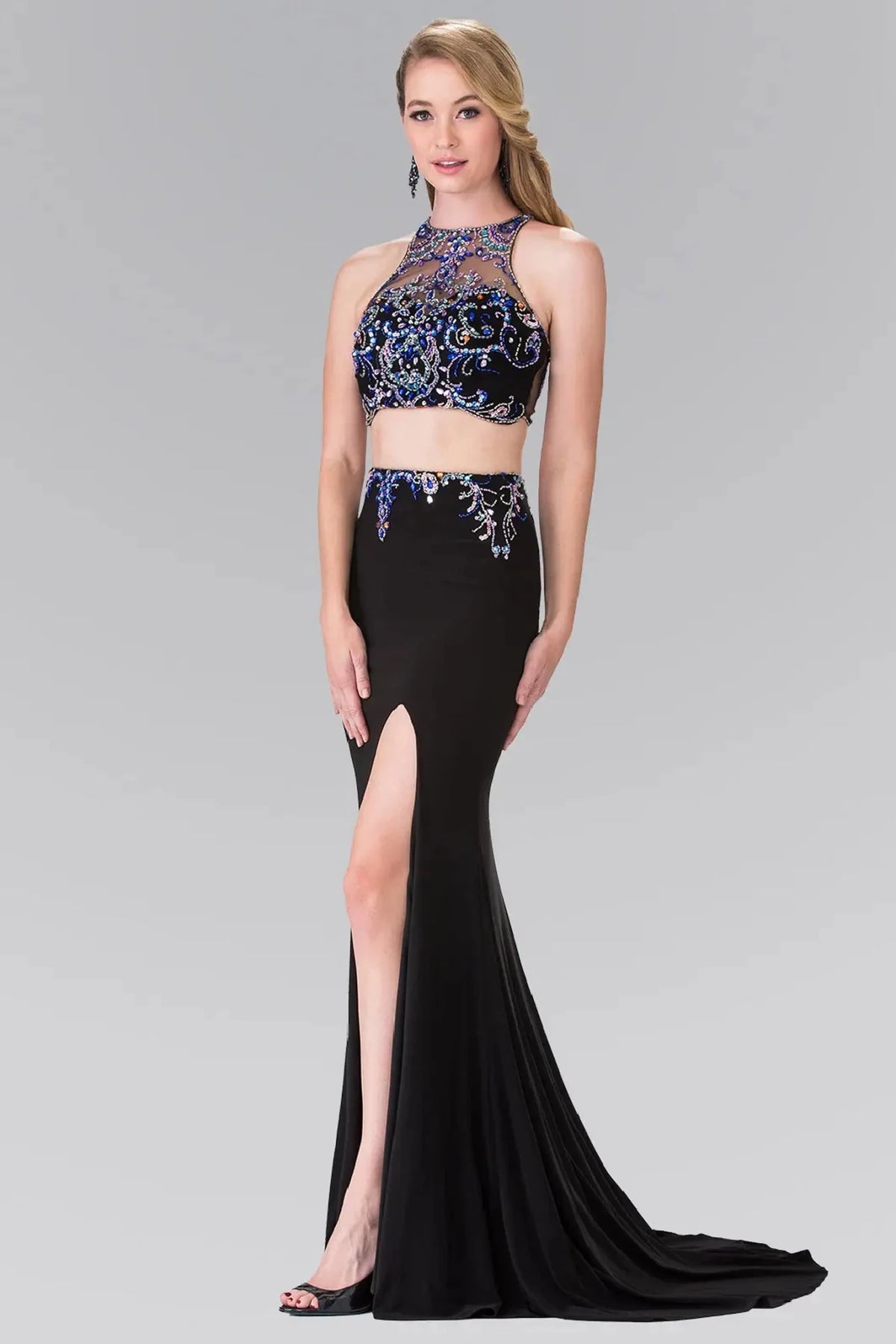 Full-length front view shows sequin halter styling on the Black prom evening dress.