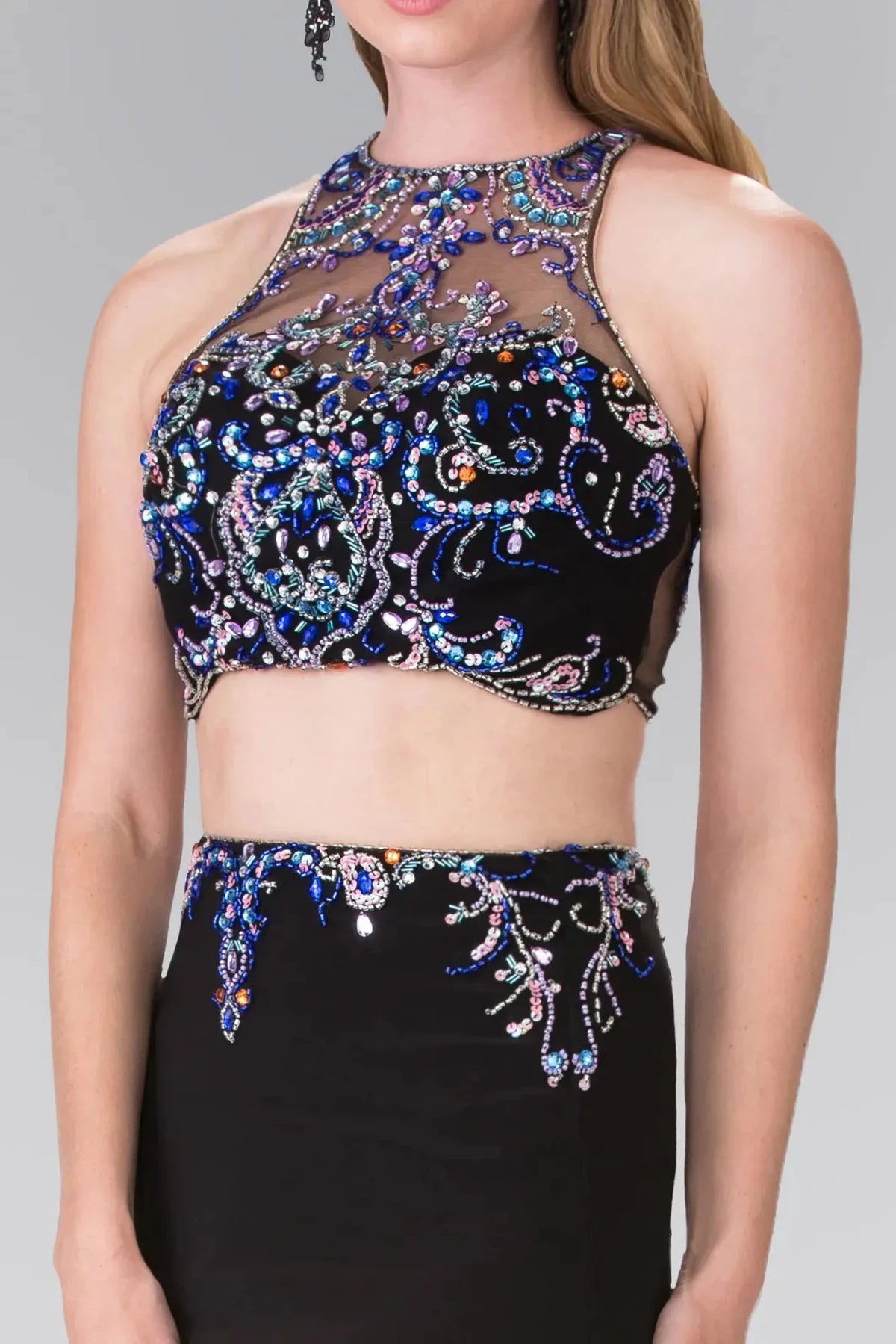 Bodice close-up reveals beadwork and sequins across the halter upper bodice of the Black prom evening dress.