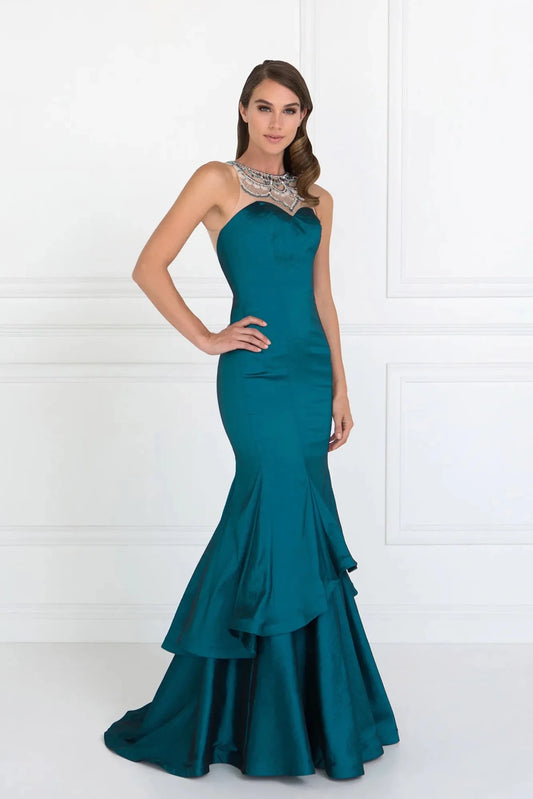 Full-length front view shows beaded styling on the Teal prom evening dress.