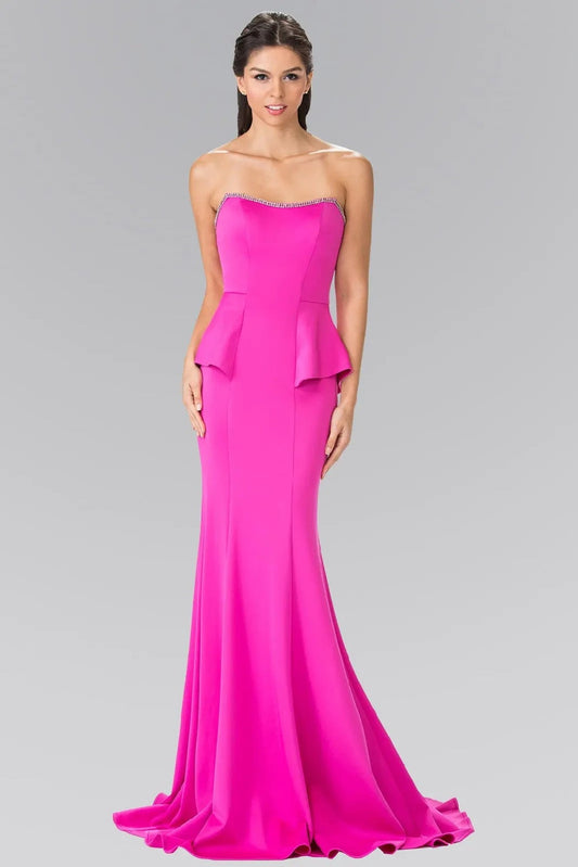 Skirt detail shows fuchsia embellished formal dress skirt detail.