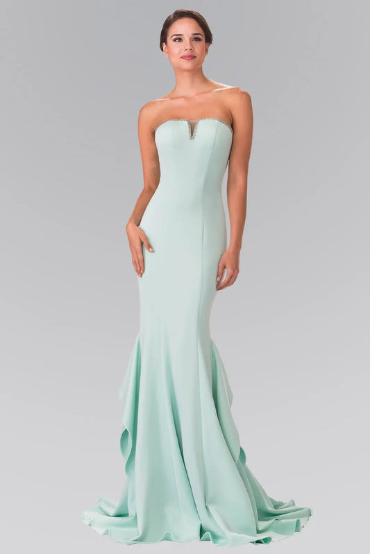 Full-length view highlights tiffany beading embellished formal dress.