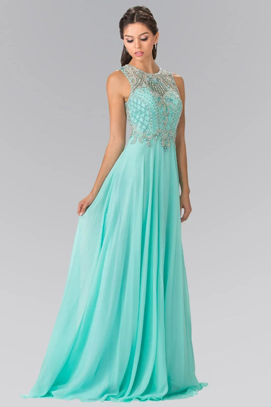 Full-length view highlights mint beading embellished formal dress.