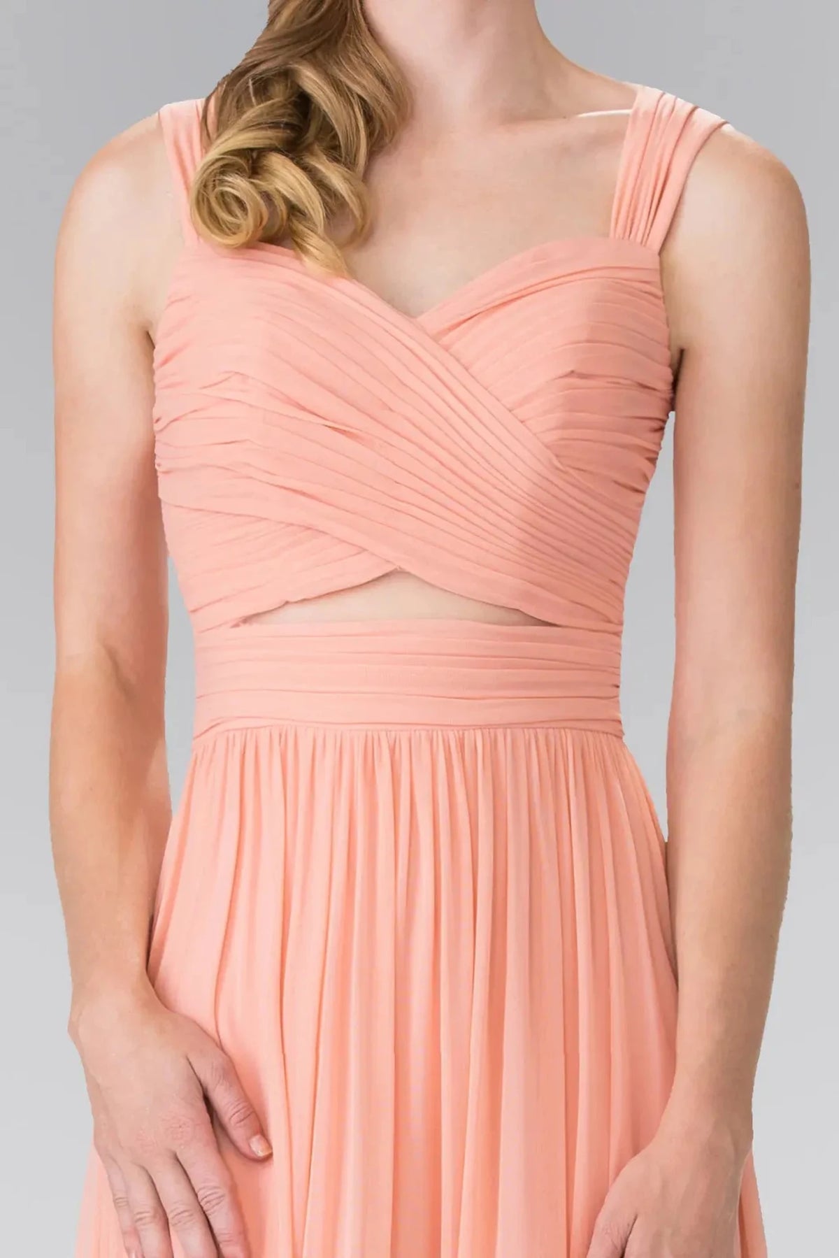 Bodice close-up reveals pleating, sheer detail, and cut-out across the sweetheart upper bodice of the Coral prom evening dress.