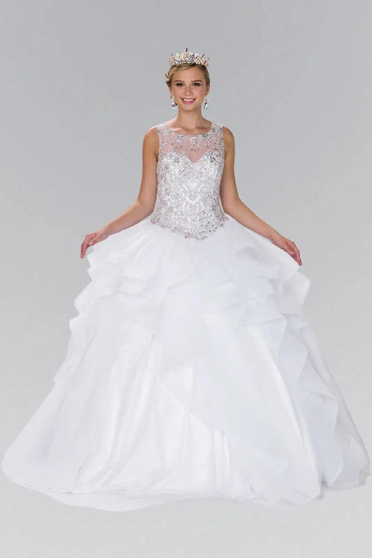 Displayed in full, the White quinceañera ball gown features a silver jeweled bodice and bright white layered skirt.