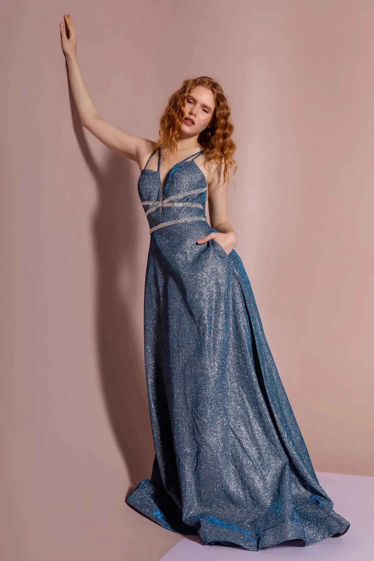 Full-length front view shows beaded styling on the Teal prom evening dress.