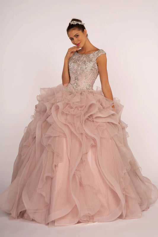 Displayed in full, the Mauve quinceañera ball gown features a crystal cap-sleeve bodice and sculpted mauve ruffle skirt.
