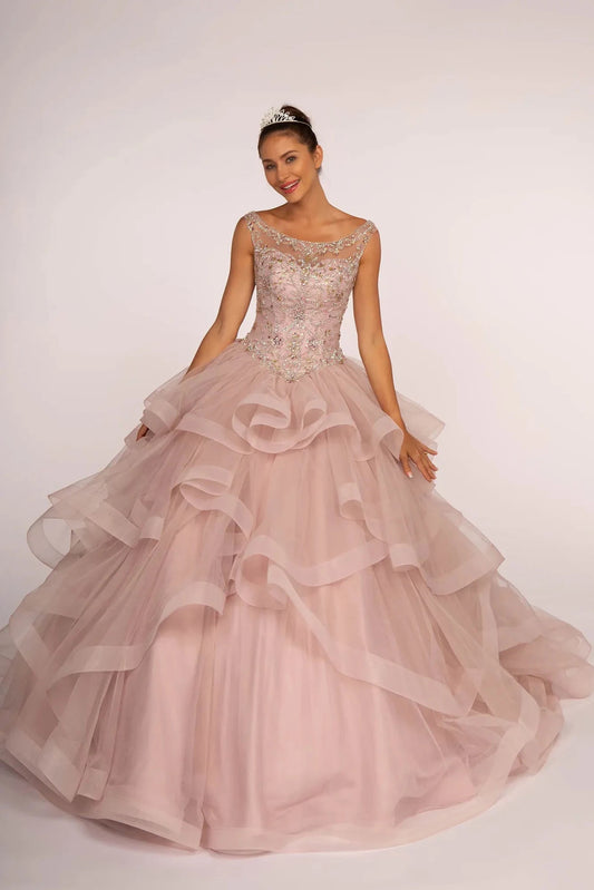 Full-length Mauve quinceañera ball gown showcases a crystal bateau bodice and tiered mauve tulle skirt.