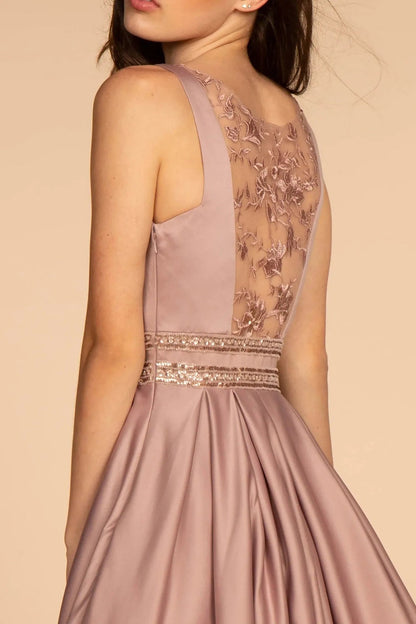 Full-length view highlights mauve beading embroidery floral formal dress.