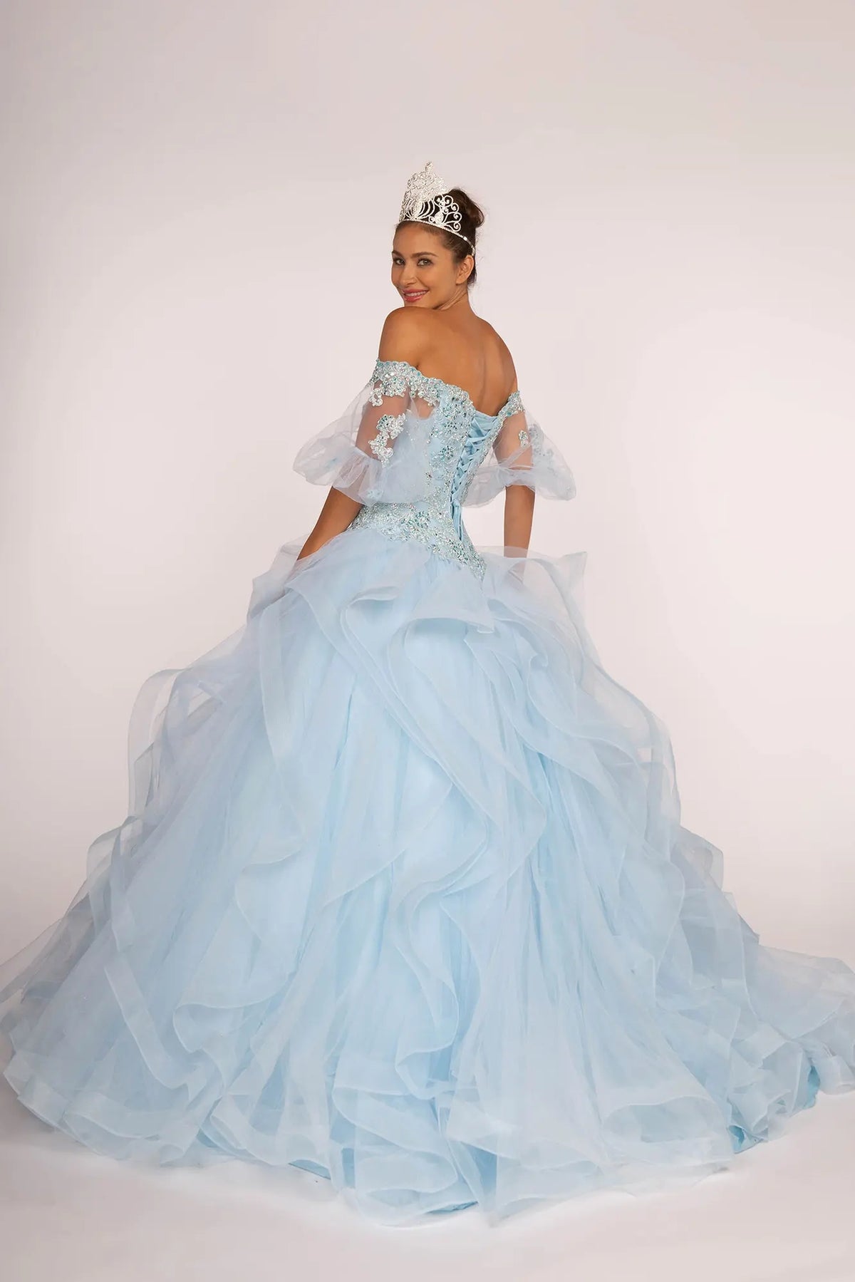 Lace-up back reveals the Baby Blue quinceañera ball gown with lace-up back and jeweled sweetheart bodice.