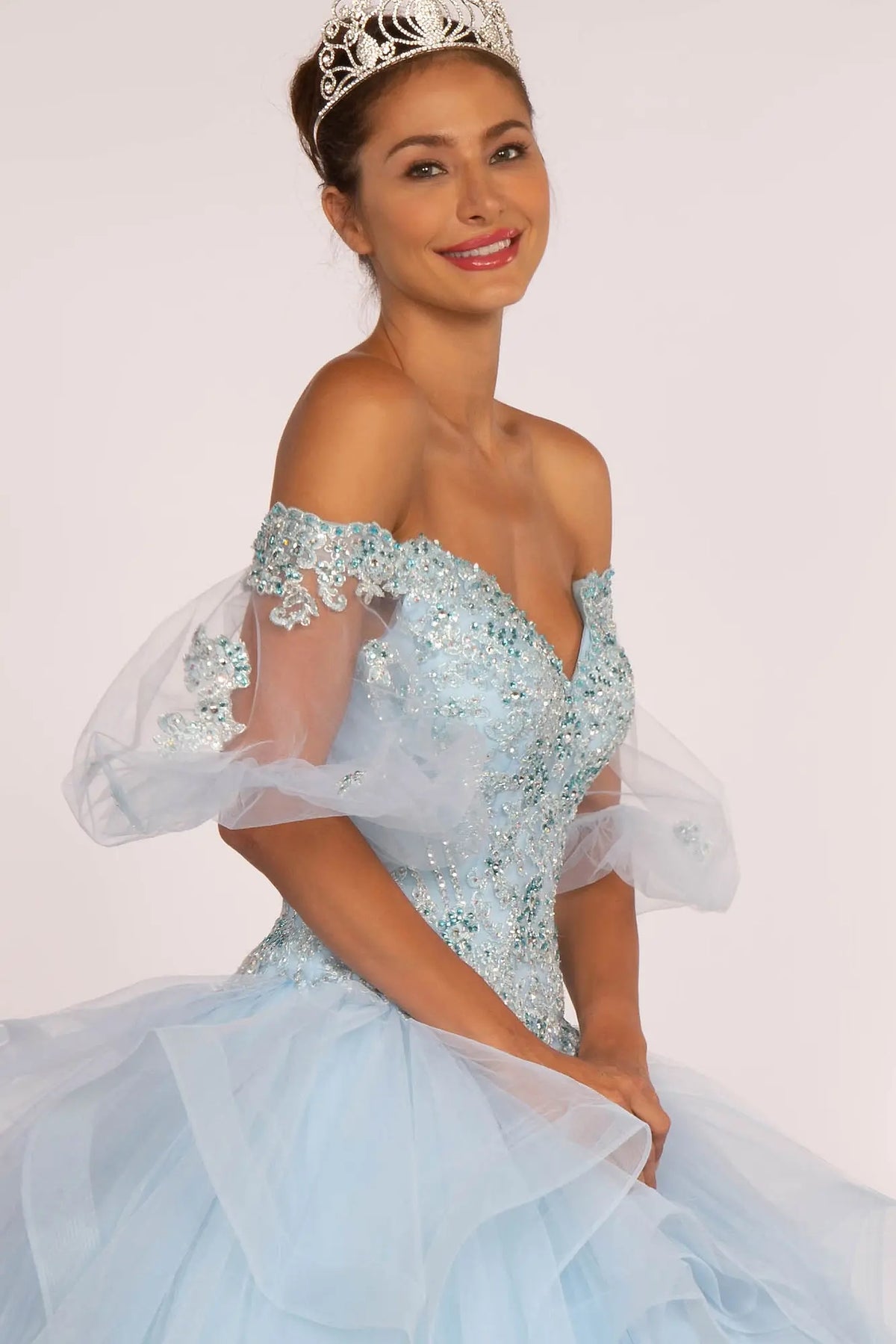 Bodice close-up highlights the Baby Blue quinceañera ball gown with jeweled sweetheart bodice.