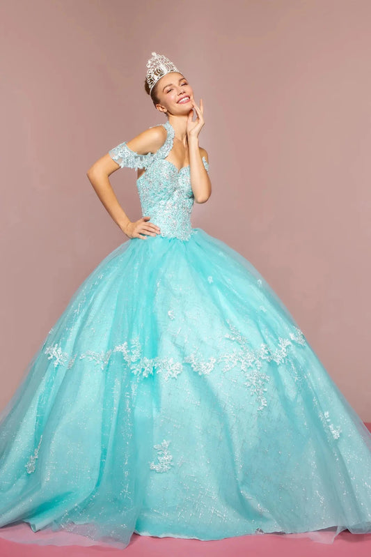 Displayed in full, the Aqua quinceañera ball gown features lace off-shoulder straps and floral appliqué on the aqua skirt.