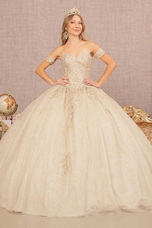 Champagne quinceañera dress with an embroidered sweetheart bodice and full glittering skirt.