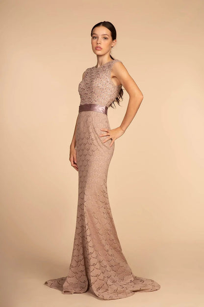 Full-length view highlights mauve embellished sequins formal dress.