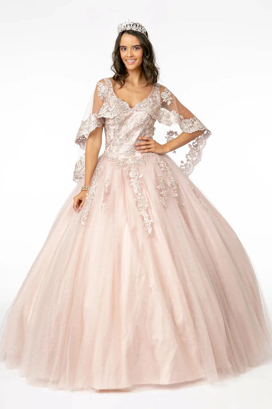 Displayed in full, the Mauve quinceañera ball gown features a lace cape overlay and floral appliqué on the ball skirt.
