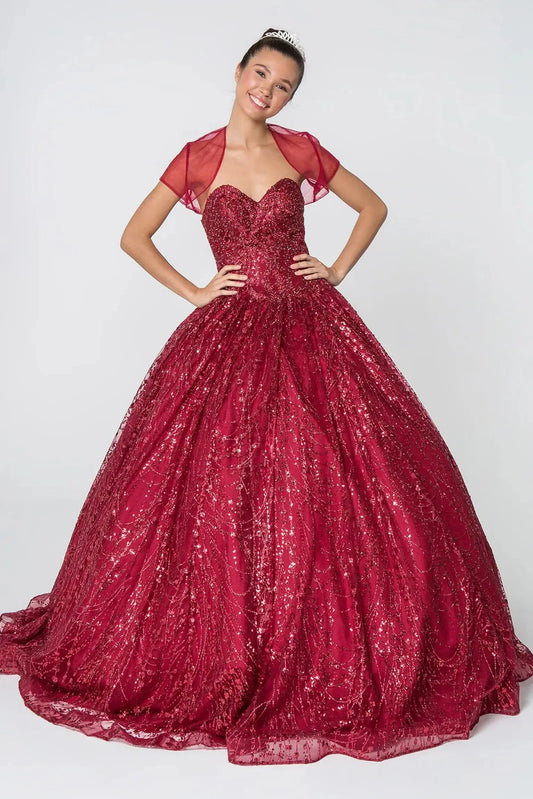 The Burgundy quinceañera ball gown appears head to toe with a glittering strapless bodice and sweeping burgundy skirt.
